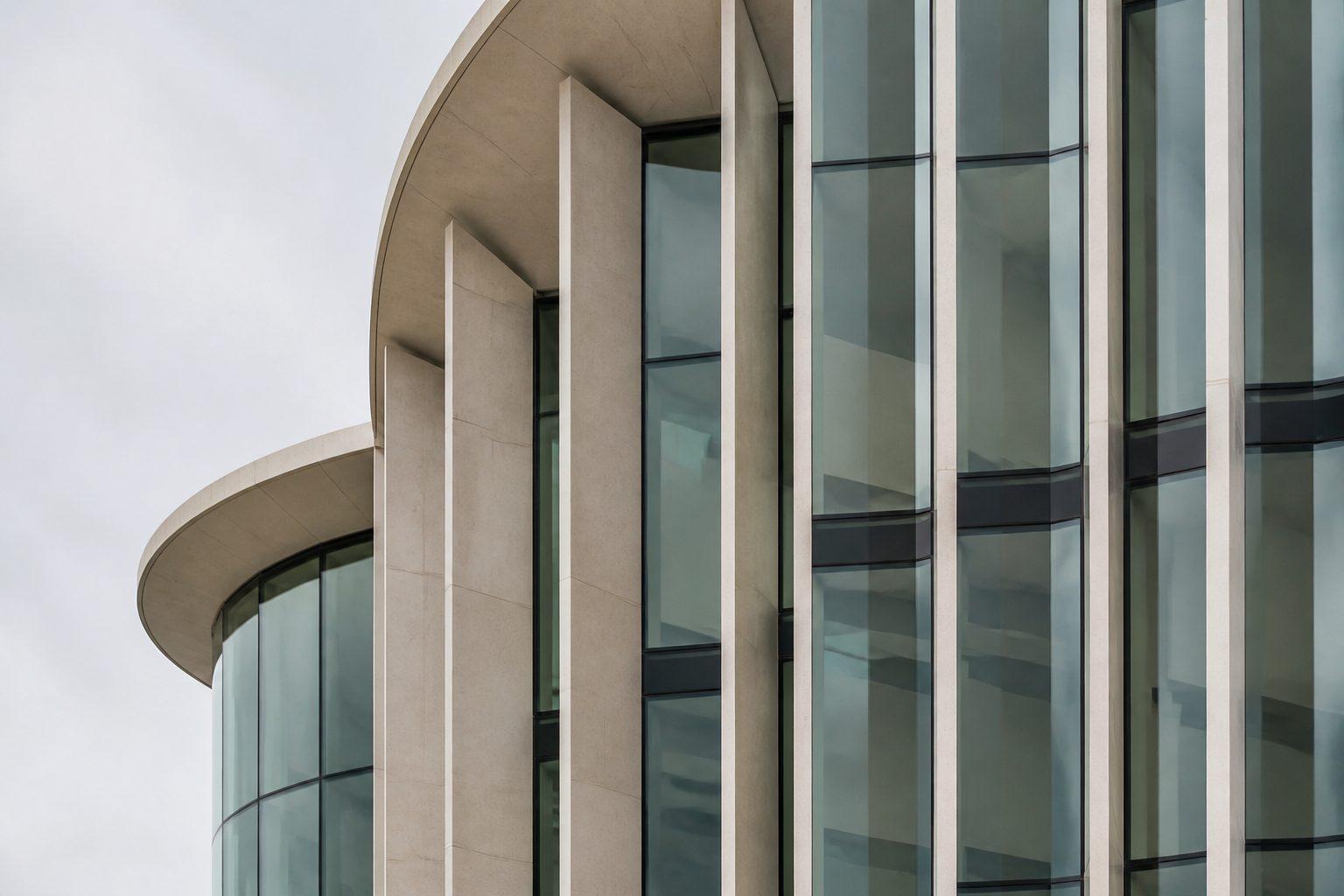 Glass facade with vertical fins for North Glass website